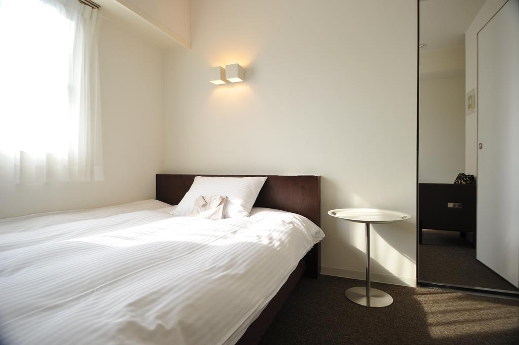 7 Days Hotel Plus Kōchi Quarto foto