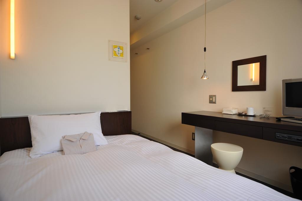 7 Days Hotel Plus Kōchi Quarto foto