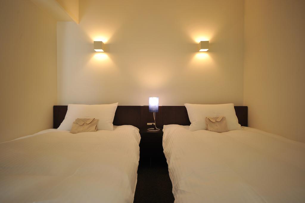 7 Days Hotel Plus Kōchi Quarto foto